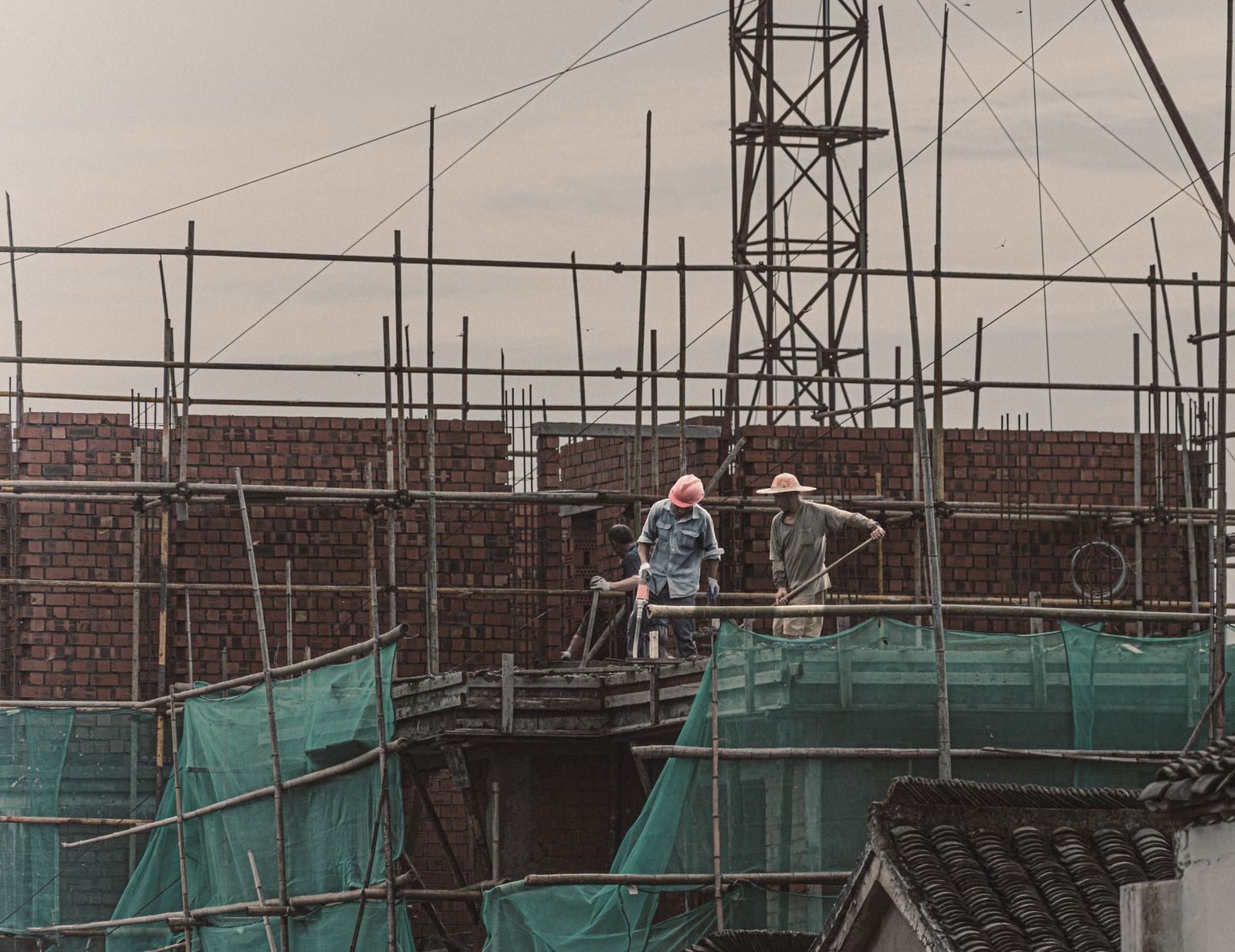 Construction crew on scaffolding