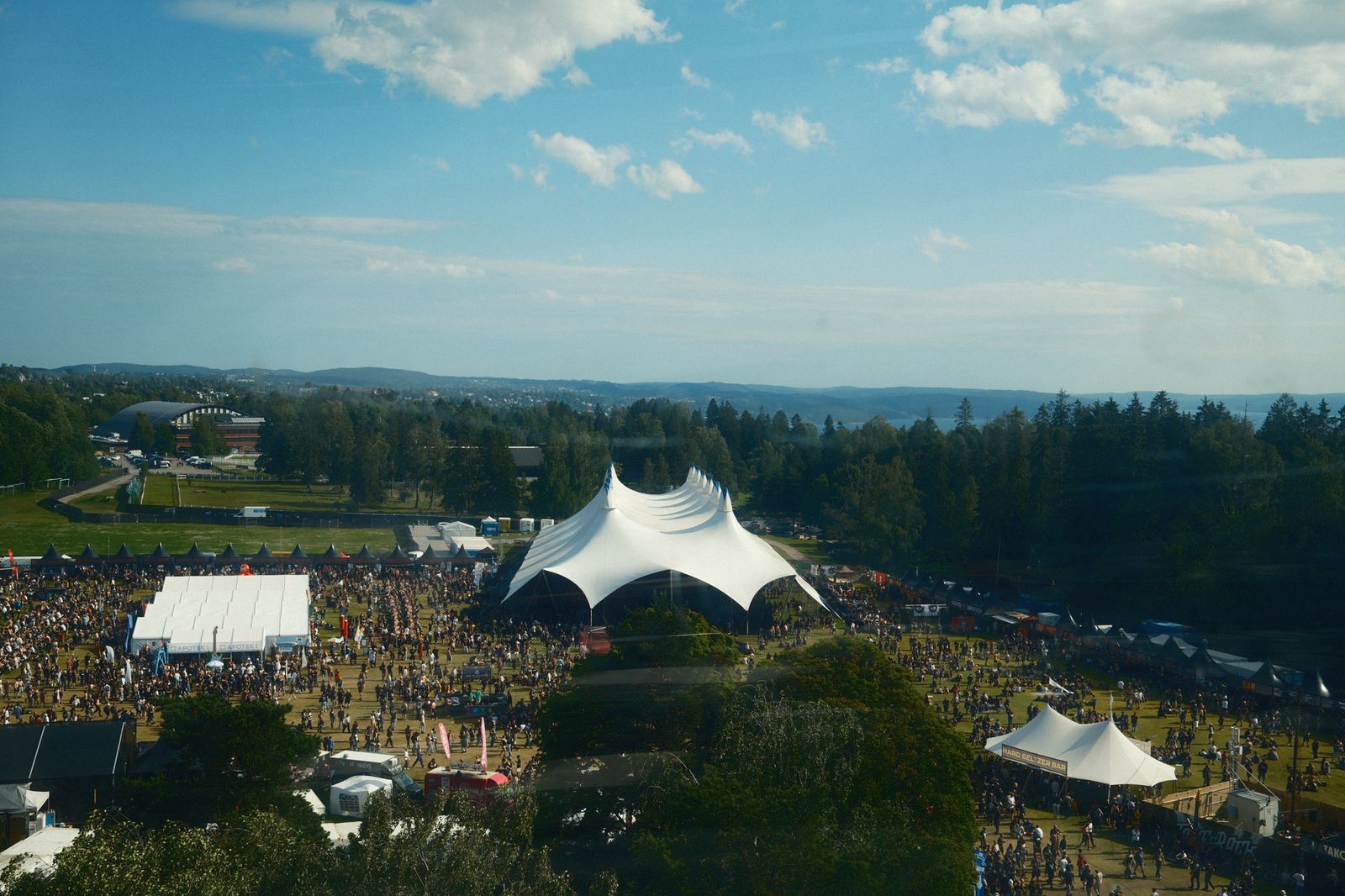 Aerial view of festival grounds with production tents