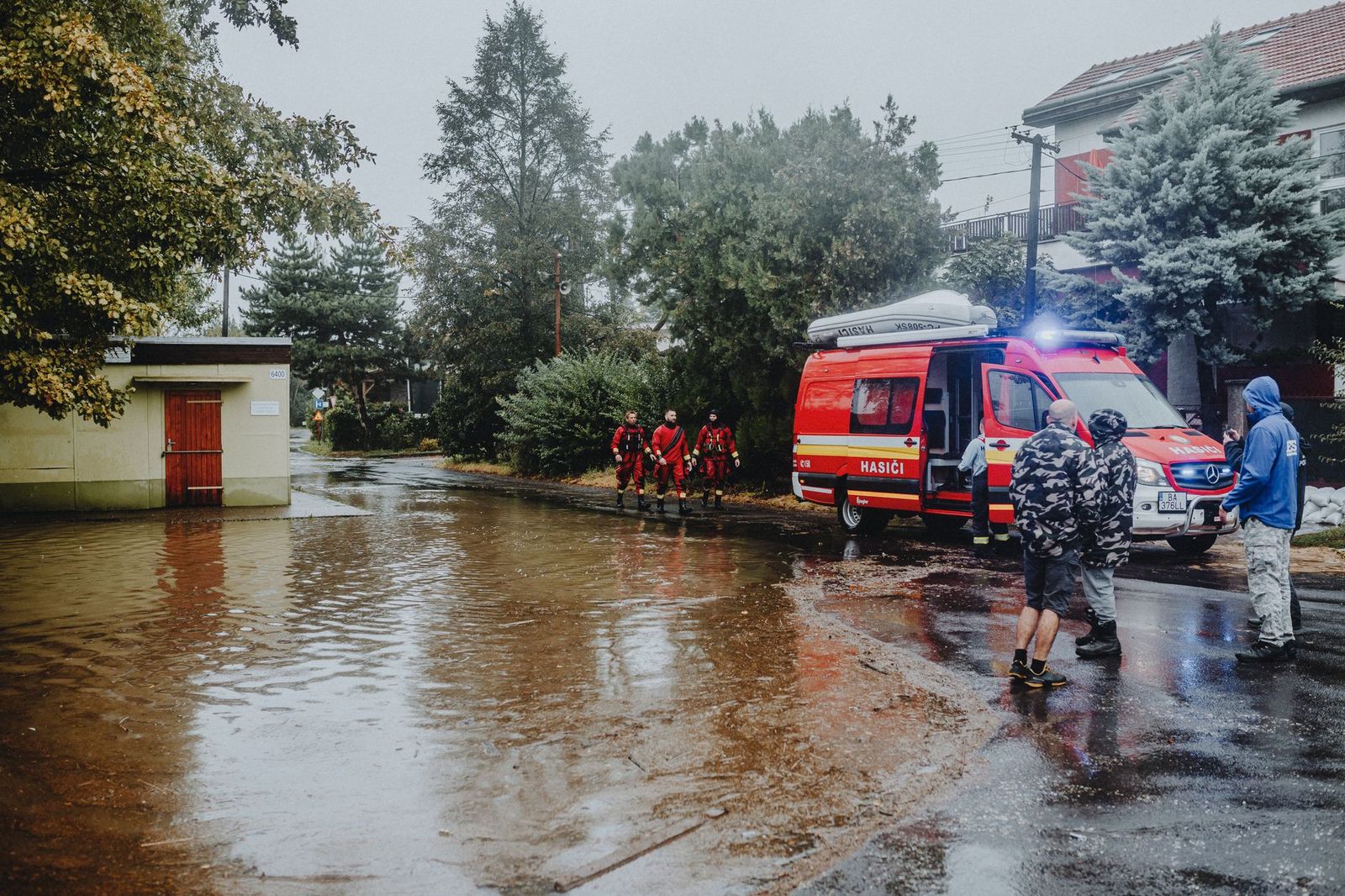 Flood disaster response crew on a flooded street