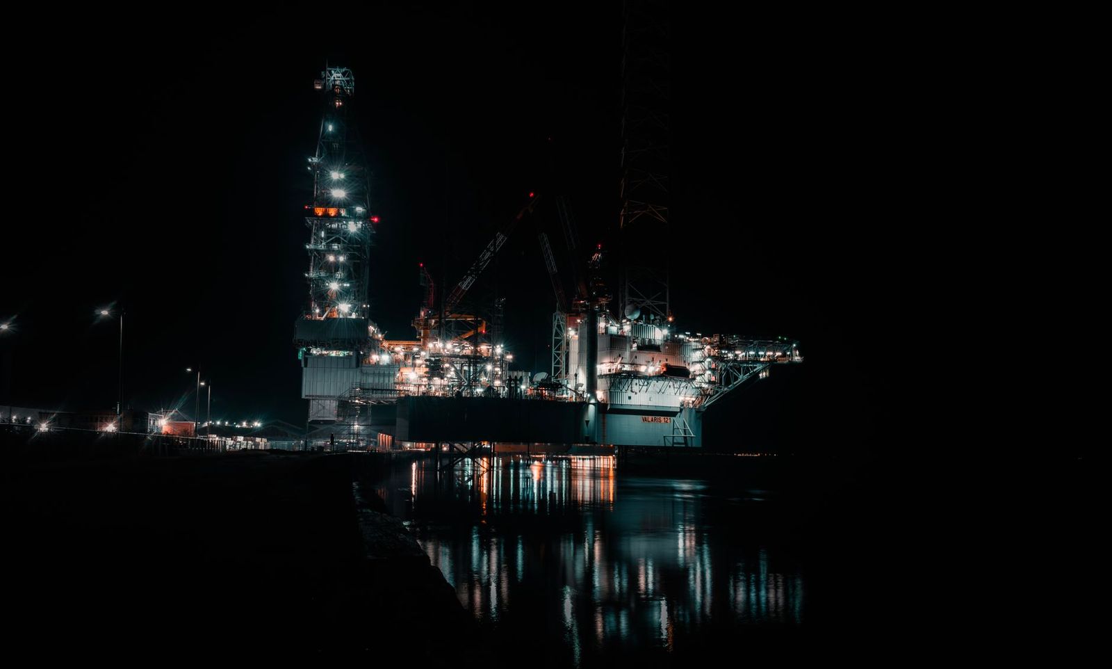 Oilfield drilling rig night