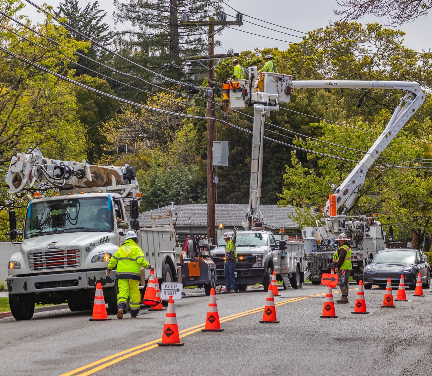 Storm restoration utility crew working a residential street