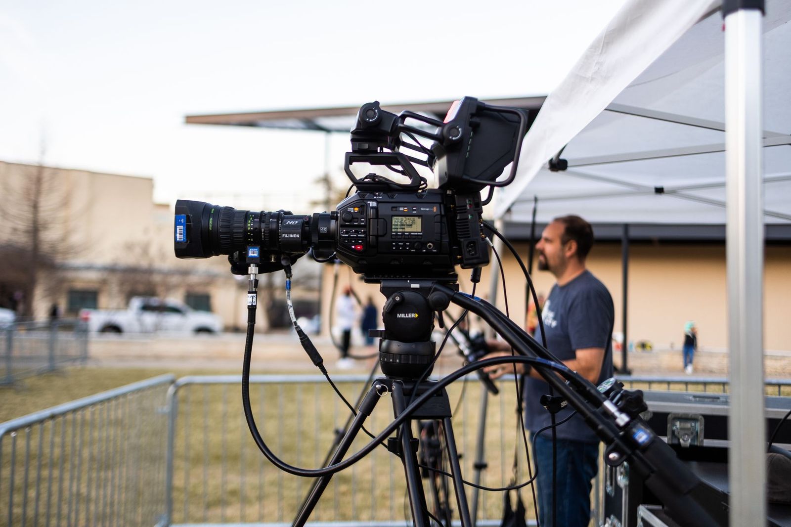 Television production crew filming on location