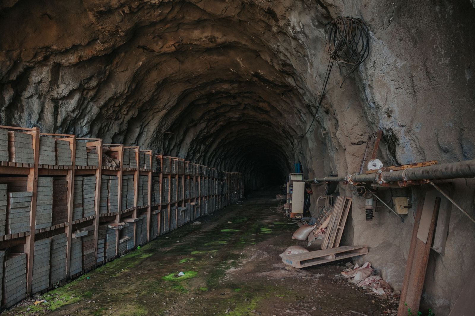 Underground mine tunnel with rail tracks